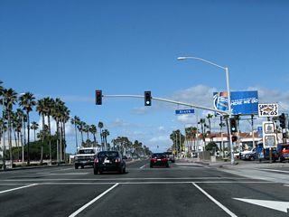 Northbound California 1 (Pacific Coast Highway) meets Sixth Street.
