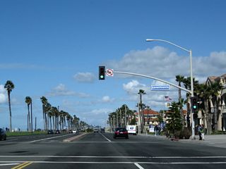 Leaving the downtown area of Huntington Beach, California 1 (Pacific Coast Highway) north approaches Seventeenth Street.