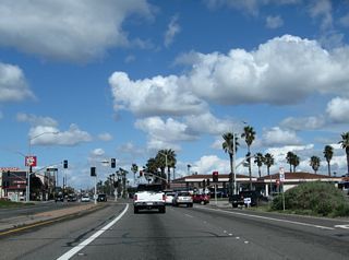 Leaving Bolsa Chica, northbound California 1 next intersects Warner Avenue. California 1 mostly remains in the city of Huntington Beach, but portions also cruise through Sunset Beach, an unincorporated community adjacent to the beach.