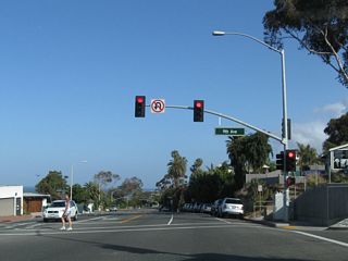 The next traffic signal along California 1 (Coast Highway) north is with Ninth Avenue.