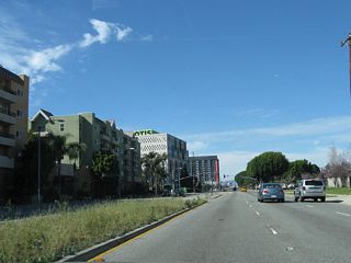 California 1 curves north again after passing under Westchester Parkway. Entering the neighborhoods of Loyola Village and Westchester in the city of Los Angeles, California 1 next intersects La Tijera Boulevard.