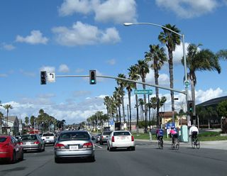 Northbound SR 1 meets Studebaker Road at this intersection. This section is not contiguous with the main section of Studebaker Road, which SR 1 connects to via Second Street east. Studebaker Road proceeds north from Second Street to S R22 east, I-605 north, and Interstate 405. The Long Beach Bike Route 1 signs are much more common than state route reassurance shields along SR 1 in Long Beach.