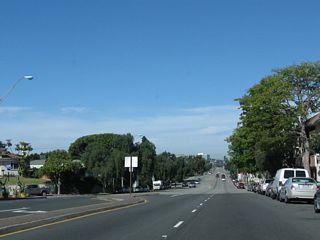 Leaving the intersection with California 22 (Seventh Street) in the city of Long Beach, northbound California 1 (Pacific Coast Highway [PCH]) proceeds northwest past California State University at Long Beach. The university campus is generally located east of California 1, south of Interstate 405, and north of California 22.
