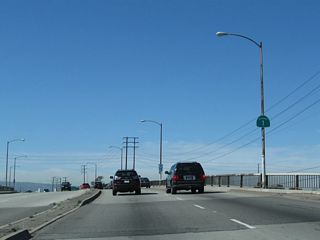 A California 1 reassurance shield is posted on the bridge that carries Pacific Coast Highway over the Los Angeles River. Despite its name, the Pacific Coast Highway stays pretty far inland, avoiding downtown Long Beach and the ample beach strand that gives Long Beach its name. Take Interstate 710 south to downtown, the beach, and waterfront attractions (including the Aquarium of the Pacific and Queen Mary).
