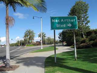 Follow MacArthur Boulevard northeast to John Wayne (Orange County) Airport and Toll California 73.