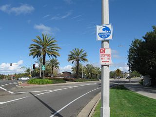 The intersection with MacArthur Boulevard is located around Milepost 16 on California 1.