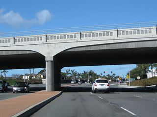 California 1 (Coast Highway) passes under California 55. This interchange marks the southern terminus of California 55. Newport Boulevard continues south onto Balboa Peninsula.