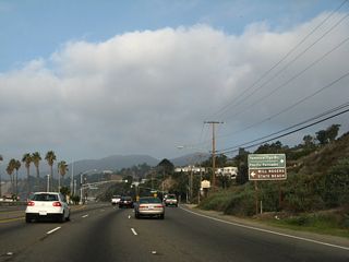 Northbound California 1 (Pacific Coast Highway) meets Temescal Canyon Road near Will Rogers State Park in Pacific Palisades. Near here is the original site of the Port of Los Angeles before it was moved to its current location near San Pedro and Long Beach.