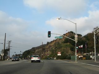 SR 27 (Topanga Canyon Boulevard) climbs northward into the Santa Monica Mountains through Topanga Canyon to Woodland Hills in Los Angeles and San Fernando Valley.