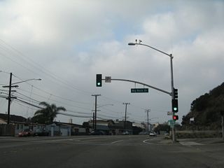 Northbound (westbound) California 1 (Pacific Coast Highway) meets Big Rock Drive at this signalized intersection.