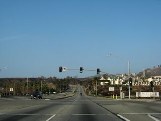 Webb Way serves as a turnoff to Malibu City Hall and Civic Center from California 1 (Pacific Coast Highway). Pepperdine University comes into view on the hill overlooking the civic center area.