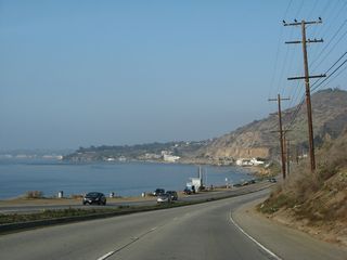 California 1 (Pacific Coast Highway) runs directly alongside the Pacific Ocean at Corral Canyon.