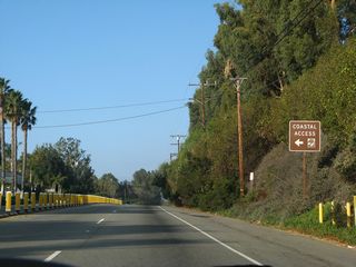 SR 1 northbound at the public access point to Escondido Beach. Maintenance over public access ways in Malibu are addressed by 'offers to dedicate' (OTDs). These are legal easements that provide access to the coast across private property that often run between densely packed multimillion-dollar beach homes along the Pacific Coast Highway. The California Coastal Conservancy works in partnership with local governments, other state agencies and nonprofit land trusts to acquire, develop and manage these public passageways.1