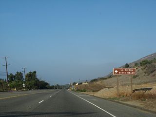 La Piedra Beach follows along the south side of PCH after the intersection with Encinal Canyon Road.