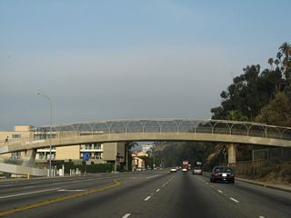 A fourth pedestrian bridge crosses over California 1.