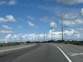Wetlands spread along the east side of Pacific Coast Highway at Seal Beach National Wildlife Refuge.