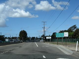 Leaving preserved areas, SR 1 (Pacific Coast Highway) north nears Seal Beach Boulevard and Downtown Seal Beach.