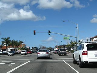 California 1 (Pacific Coast Highway) approaches Balboa Drive north  and 12th Street south .