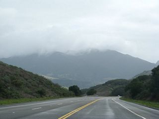 Only one lane is allocated for southbound traffic on this seven percent grade, while northbound traffic has a climbing lane.