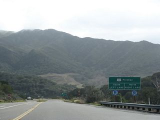 Nearing the bottom of the hill, southbound California 1 approaches U.S. 101. Use U.S. 101 north to Santa Maria and San Francisco and south to Santa Barbara, Ventura, and Los Angeles.