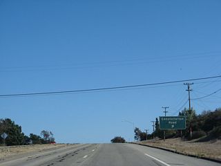 Southbound California 1 (Lompoc Casmalia Road) meets Exit 211, Constellation Road to Vandenberg Village at the top of this hill.