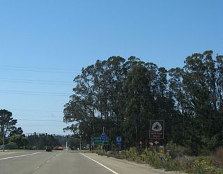 Southbound California 1 (Cabrillo Highway) approaches California Boulevard and Lompoc Casmalia Road. California 1 turns south onto Lompoc Casmalia Road, while the main lanes will continue straight into Vandenberg Space Force Base.