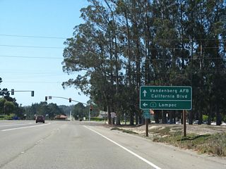 Southbound California 1 (Cabrillo Highway) meets California Boulevard and Lompoc Casmalia Road. The left lane continues along California 1 (Lompoc Casmalia Road) south, the middle lanes continue straight into Vandenberg Space Force Base, and the right lane turns onto Lompoc Casmalia Road north.