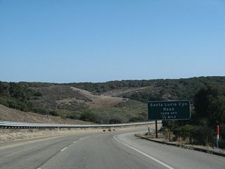 Southbound California 1 (Lompoc Casmalia Road) approaches Santa Lucia Canyon Road to western Lompoc.