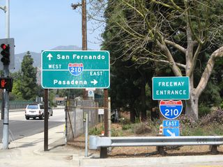 Traveling almost due north, eastbound Angeles Crest Highway intersects Interstate 210 in La Canada Flintridge. Upon reaching Interstate 210, the first right turn is an on-ramp to Interstate 210 east to Pasadena and San Bernardino. Traffic from California 2 joins Angeles Crest Highway after departing from Interstate 210 east.