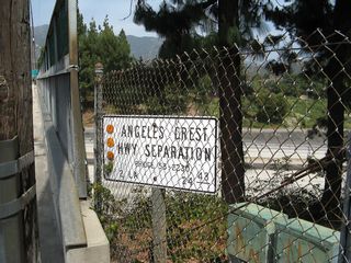 The bridge separation sign between California 2 and Interstate 210 is identified as the Angeles Crest Highway Separation.