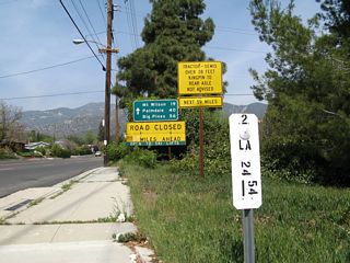 Continuing north, a mileage sign along California 2 (Angeles Crest Highway) east provides the distance to Mt. Wilson (19 miles), Palmdale (40 miles via Los Angeles County N-3 (Angeles Forest Highway)), and Big Pines (56 miles).