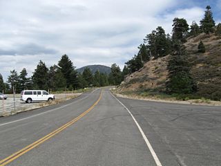 Eastbound California 2 (Angeles Crest Highway) meets California 39 (San Gabriel Canyon Road) south, although there are no signs to acknowledge this intersection (one has to know what to look for). The next left connects to the Islip Saddle parking area. Ahead, watch for winter closures after the Islip Saddle parking area. During and after winter storms, a barricade is erected just after the California 39 intersection to prevent use of the highway between here and Big Pines/Wrightwood.