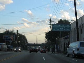 Westbound (southbound) California 2 approaches U.S. 101 (Hollywood Freeway). The freeway travels south to downtown Los Angeles and northwest to Hollywood.
