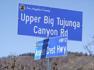 Skipping ahead, westbound California 2 (Angeles Crest Highway) meets Upper Big Tujunga Road, which travels west to connect with Los Angeles County N-3 (Angeles Forest Highway). Photo taken by Martin Grahl (05/21/10).