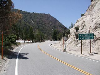 Westbound California 2 (Angeles Crest Highway) approaches Mt. Wilson Red Box Road, which travels south to Mt. Wilson. California 2 continues southwest toward the junction with Angeles Forest Highway, La Canada-Flintridge, and Glendale. Photo taken by Martin Grahl (05/21/10).