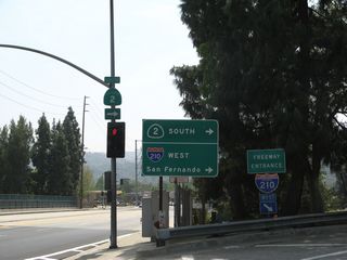 Southbound Angeles Crest Highway passes over Interstate 210 in La Canada Flintridge. Angeles Crest Highway only travels a short distance further until it ends at Foothill Boulevard, which is former California 118. This state route was eliminated as the segments of Interstate 210 freeway was completed.