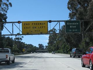 The final interchange along California 2 west (south) is with Glendale Boulevard. To continue on California 2 (Glendale Boulevard) west, stay left. To taken Glendale Boulevard north (Exit 12), stay right.