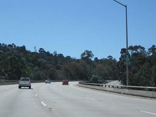 A California 2 south reassurance shield assembly is posted on the mainline freeway as we pass over Interstate 5.
