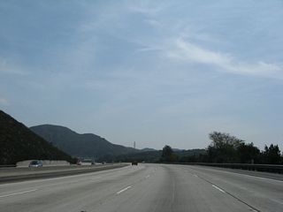 California 2 continues south as a freeway with four southbound lanes.