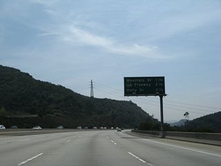 This mileage sign along California 2 (Glendale Freeway) south provides the distance to the next three exits: Exit 18, Mountain Street; Exit 17B, California 134 (Ventura Freeway); and Exit 17A, Holly Drive.