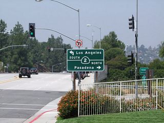 Westbound Camino San Rafael approaches the on-ramp to California 2 (Glendale Freeway) north to Pasadena (with a connection via California 134 east) and south to Los Angeles and Echo Park at Exit 18. Ahead, Camino San Rafael becomes Mountain Street. Photo taken 05/15/10 by Martin Grahl.