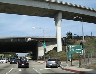 Through the California 2-134 interchange in Glendale, Harvey Drive parallels the California 2 freeway and offers connections to both directions of California 134. This series of pictures follows Harvey Drive from Broadway north to Holly Drive.