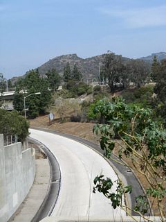 This shot shows the transition ramp from California 2 south to California 134 west as seen from Harvey Drive near Wilson Terrace in Glendale.