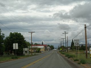Siskiyou County Route A-28 and California 3 along 11th Street through Downtown Montague.