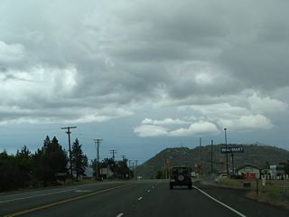 We begin traveling north along California 3 after the intersection with Westside Road, which connects California 3 with Historic U.S. 99. Due to the disconnected nature of old U.S. 99 due to the meandering path of the Interstate 5 freeway, there are segments of old U.S. 99 on both sides of Interstate 5 just south of Yreka. westside Road in particular links with Easy Street, which in turn connects to an extant segment of Historic U.S. 99 called "Old Highway 99" that leads to Gazelle. Ahead, California 3 approaches a series of stores and restaurants along with a junction with Business Loop I-5/Moonlit Oaks Road.