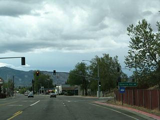 The next signalized intersection along Business Loop I-5, Historic U.S. 99, and California 3 (Main Street) is with Oberlin Road, which passes under Interstate 5 just east of this intersection.