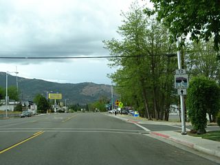 A trailblazer is posted for the State of Jefferson Scenic Byway that follows portions of California 96. Follow California 263 (Historic U.S. 99) ahead to reach the byway.