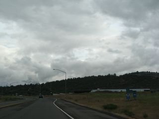 Eastbound Montague Road passes underneath the northbound lanes of Interstate 5. This marks the northern terminus of Yreka's Business Loop I-5. Ahead, California 3 proceeds east toward Montague.