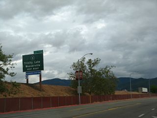 In fact, a freeway guide sign for the continuation of California 3 south to Trinity Lake and Weaverville is posted on the freeway mainline for Exit 773 via Moonlit Oaks Drive. While California 3 itself does not intersect with Interstate 5 at Exit 773, a short connection via Business Loop I-5 links the two routes together in southern Yreka.