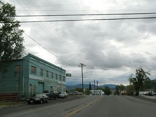 California 3 continues west past the front of Martin's Store, which is closed and in need of rehabilitation.
